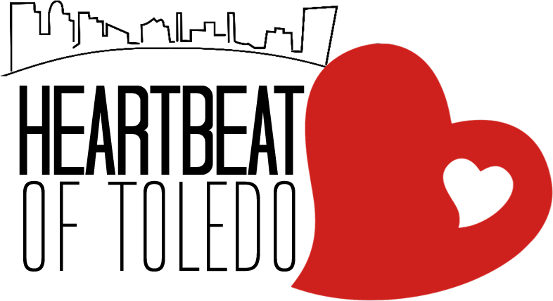 A large red heart with a smaller heart cutout.